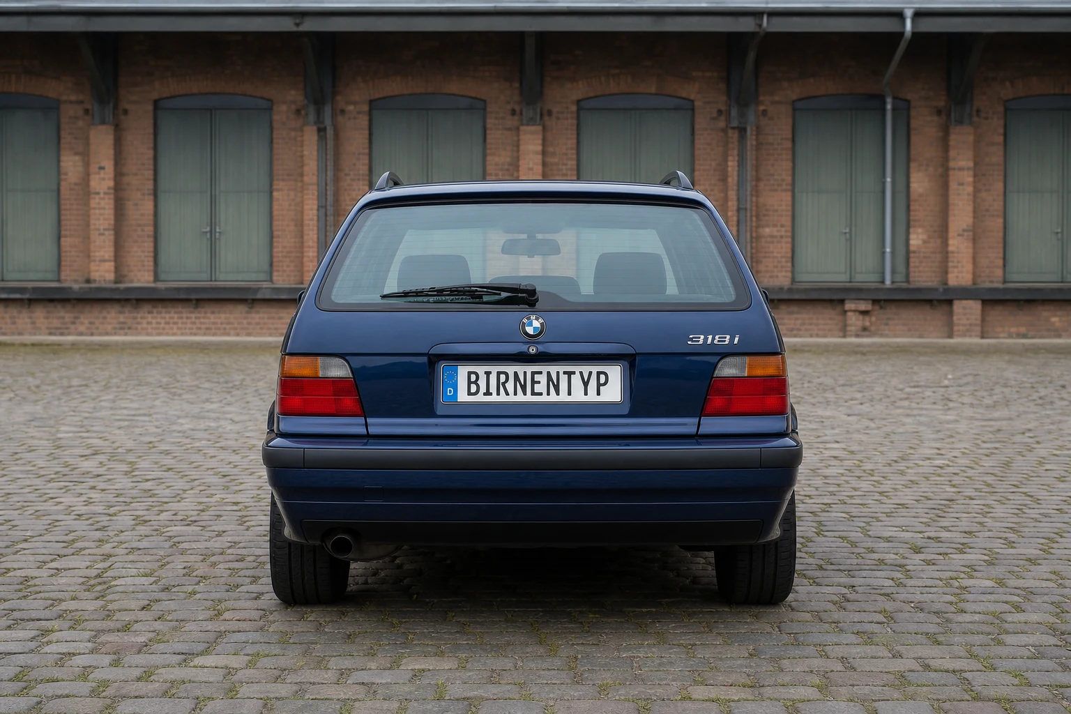 Heck-Ansicht des BMW 3er 3. Gen (Touring / Kombi) (mit KI erzeugt)