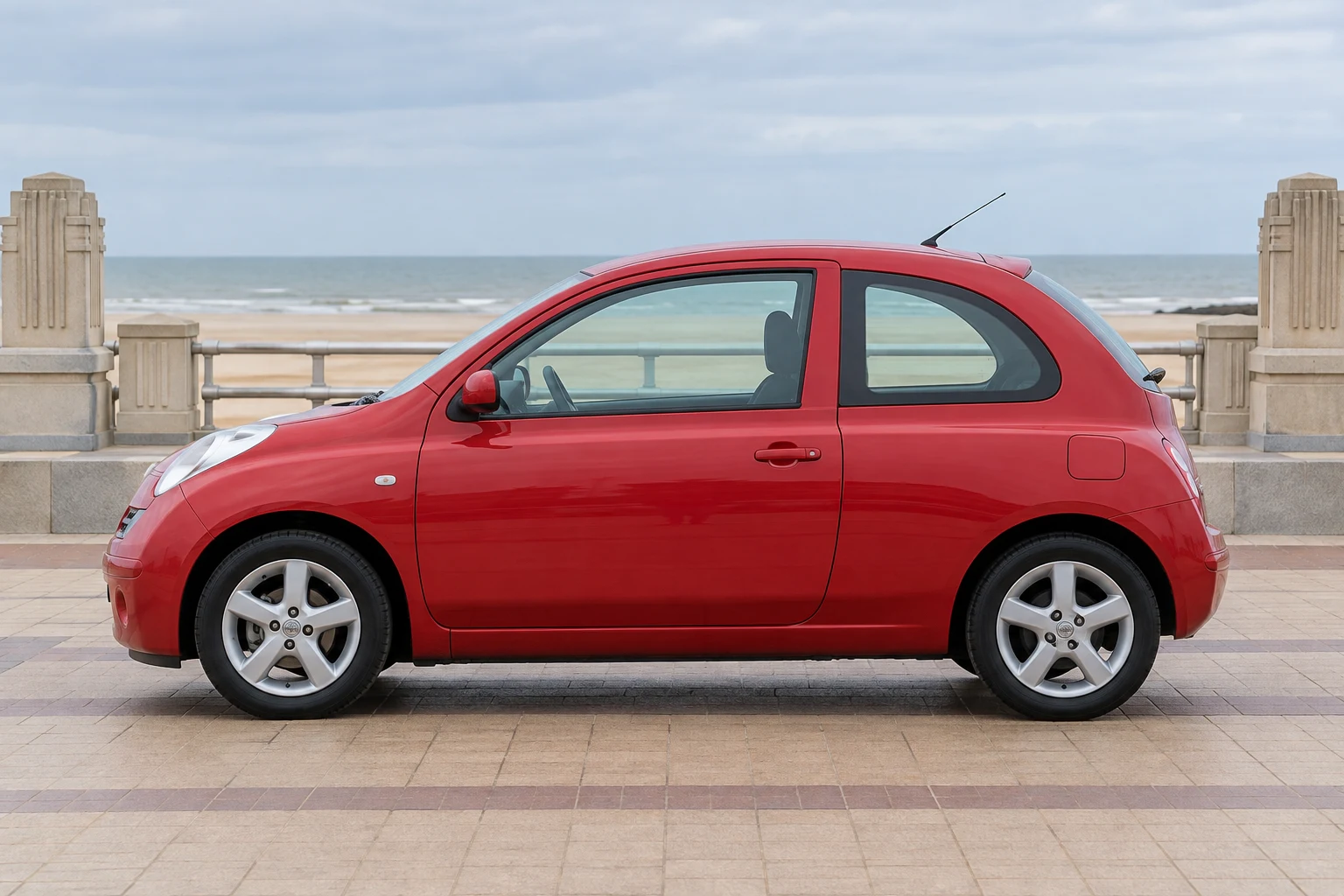 Seitenansicht (Fahrerseite) des Nissan Micra 3 als 3-Türer (Schrägheck) (mit KI erzeugt)