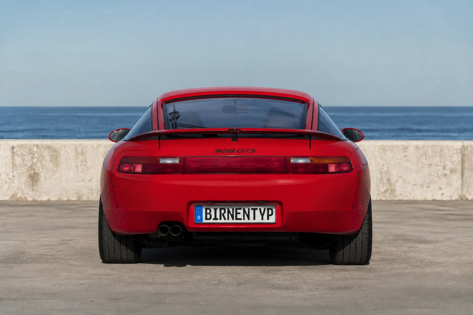 Heck-Ansicht des Porsche 928 1 (928 S4 / GT / GTS (1986–1995)) (mit KI erzeugt)