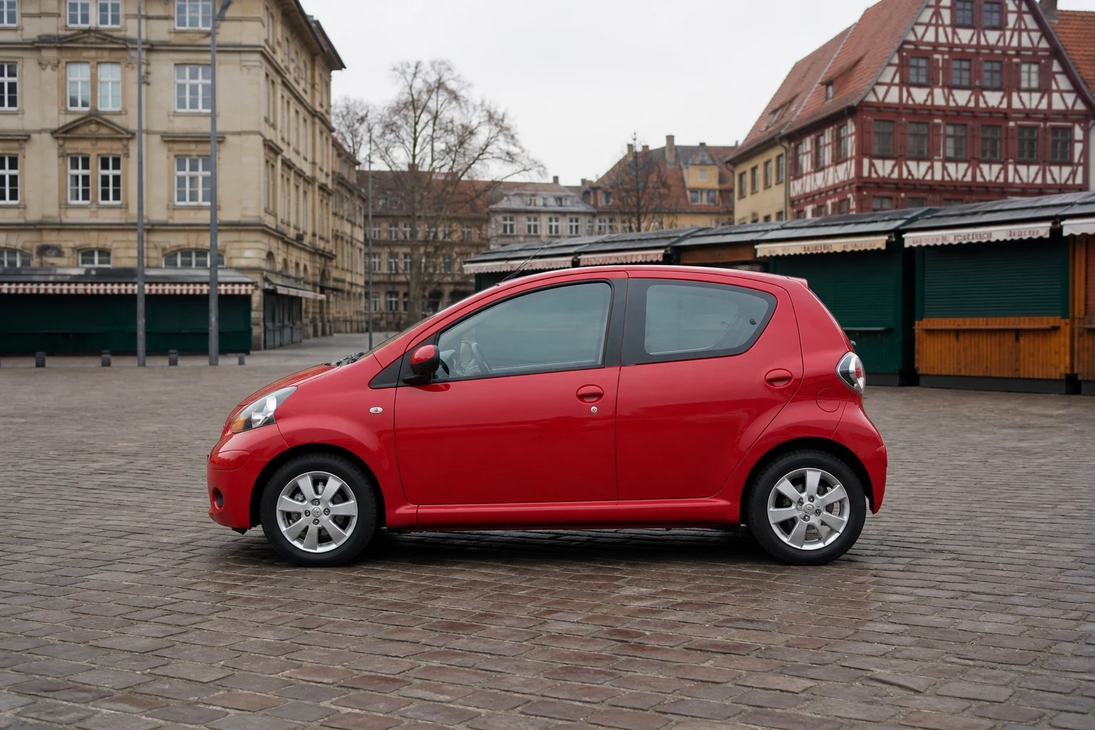 Seitenansicht (Fahrerseite) des Toyota Aygo 1. Gen als 5-Türer (mit KI erzeugt)