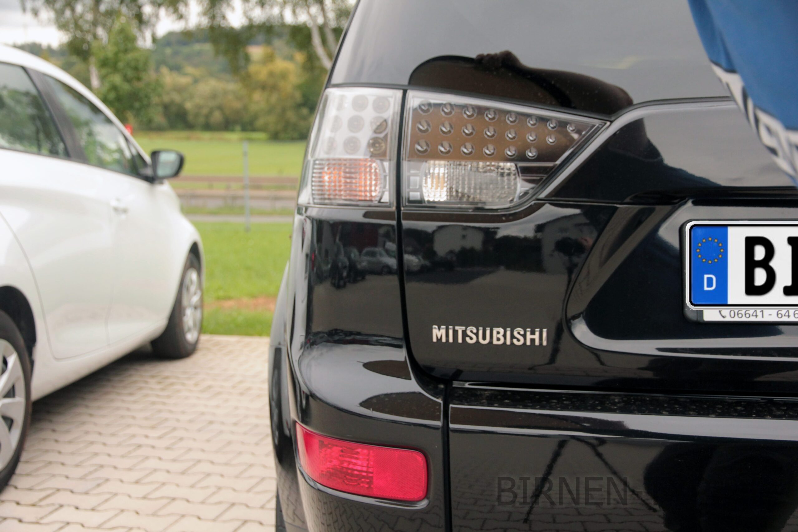 Dies ist die Rückleuchte mit Rücklicht des Mitsubishi Outlander 2 CW_W