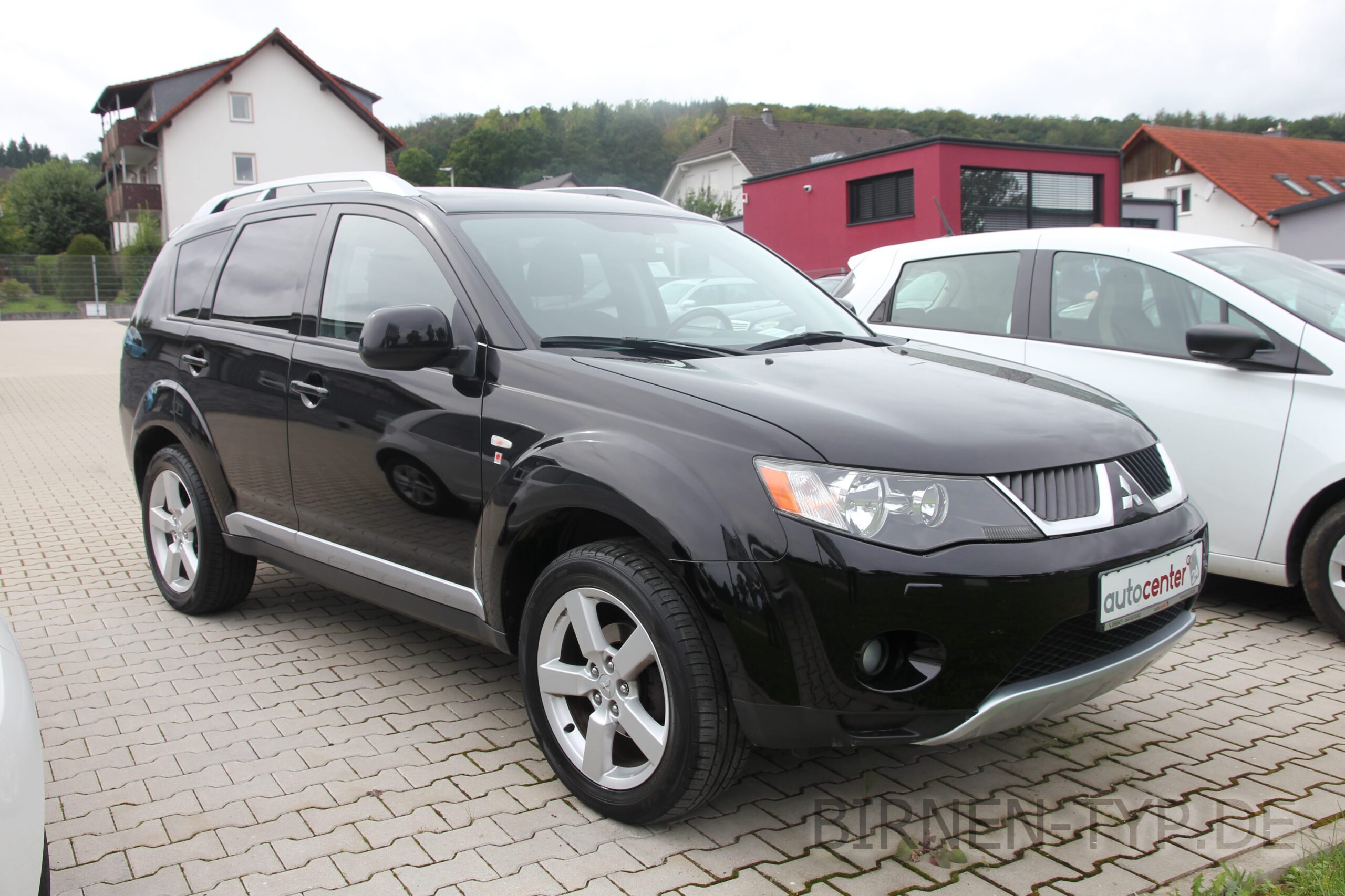 Seitenansicht des Mitsubishi Outlander 2 (2006 - 2012) links rechts Fahrerseite Beifahrerseite